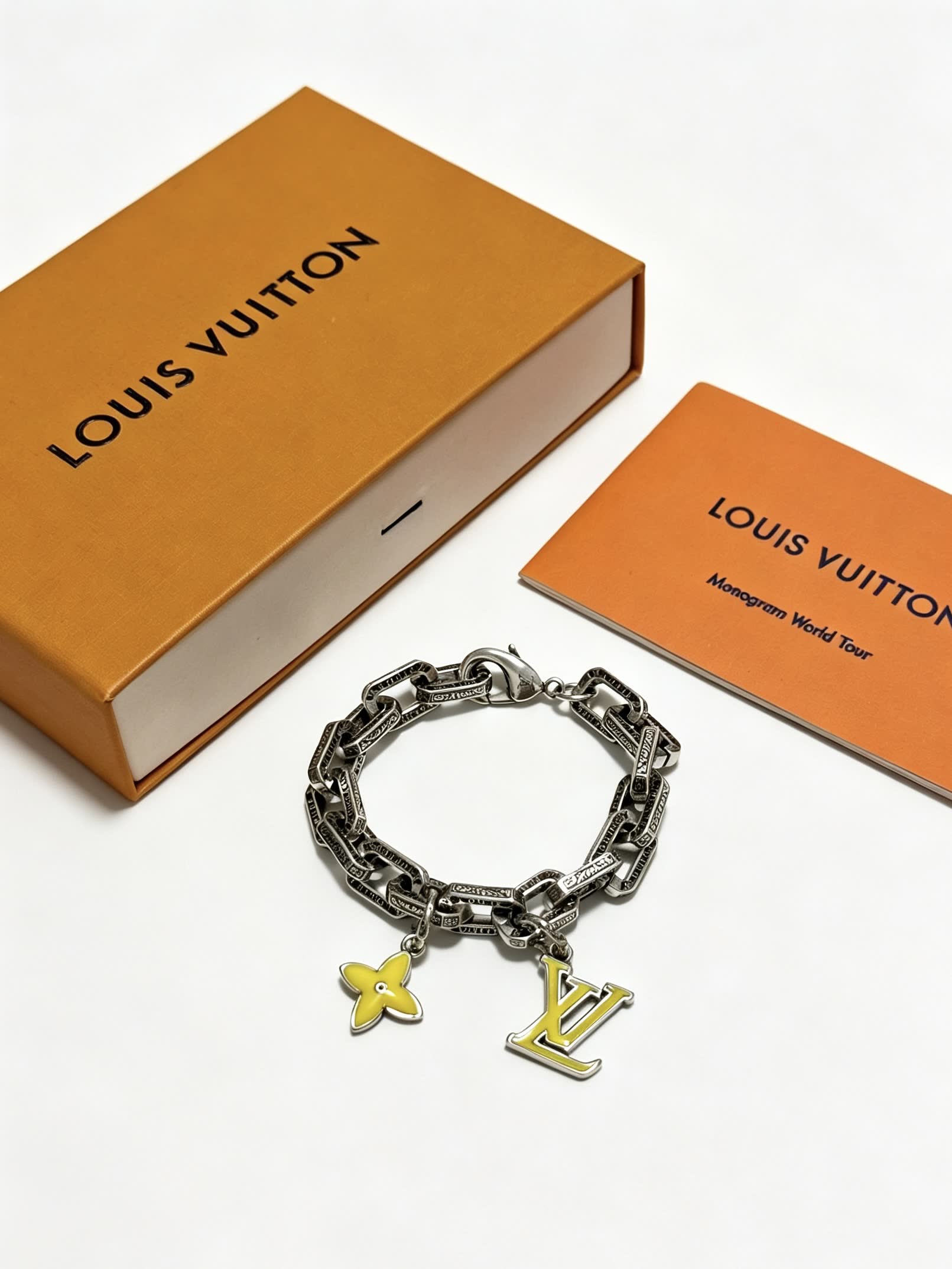Louis Vuitton Silver Bracelet with LV Logo and Flower Charm